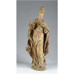 CARVED AND PARTIALLY POLYCHROME SANTOS FIGURE.