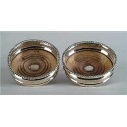 PAIR OF ANTIQUE ENGLISH SHEFFIELD WINE COASTERS.