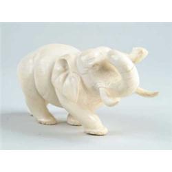 CARVED IVORY ELEPHANT.