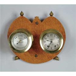 A FINE BRASS BAROMETER AND CLOCK SET.
