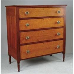 FINE SHERATON CHERRY AND BIRDSEYE MAPLE GRADUATED FOUR DRAWER CHEST.