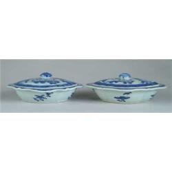 PAIR OF BLUE AND WHITE OVAL COVERED SERVING DISHES.