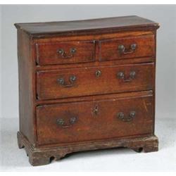 MINIATURE ENGLISH WALNUT CHIPPENDALE CHEST.