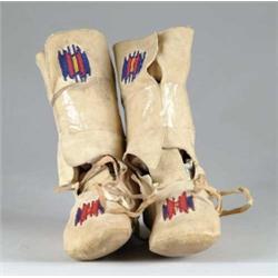 PAIR OF BEADED CHILD’S INDIAN BOOTS.