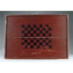 A PAINTED WOOD RED AND BLACK GAME BOARD.