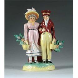 STAFFORDSHIRE FIGURAL GROUP OF MAN AND WOMAN.
