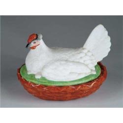ANTIQUE PORCELAIN HEN ON NEST.