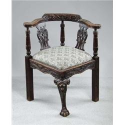 ENGLISH CARVED OAK CORNER CHAIR.