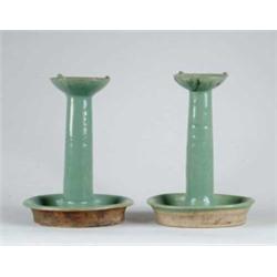 PAIR OF ORIENTAL POTTERY FAT LAMPS.