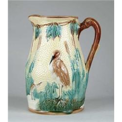 OUTSTANDING OVERSIZED MAJOLICA PITCHER WITH STORKS.