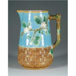 MAJOLICA PITCHER WITH TREE BLOSSOMS.
