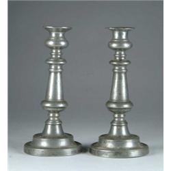 FINE PAIR OF PEWTER PUSH UP CANDLESTICKS.
