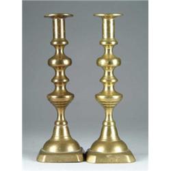 PAIR OF TALL BRASS CANDLESTICKS.