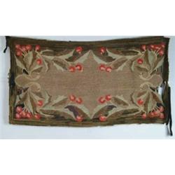 HOOKED RUG WITH HOLLY AND BERRIES.