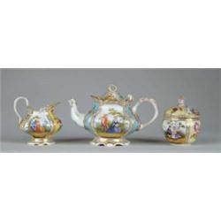THREE PIECE GERMAN DECORATED PORCELAIN TEA SET.