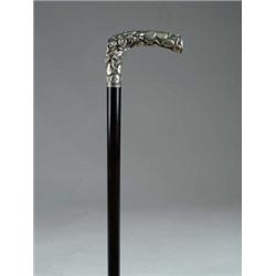 TWO SILVER TOPPED CANES.