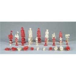 STAINED CARVED IVORY CHESS SET.