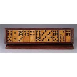 FINE SET OF CASED DOMINOES.