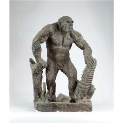 BRONZE PATINATED PLASTER FIGURE OF A GORILLA.