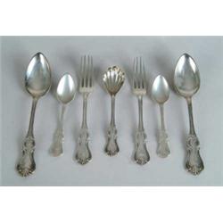 TWELVE COIN SILVER FLATWARE PIECES.