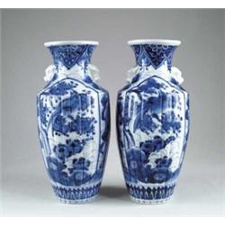 PAIR OF ORIENTAL BLUE AND WHITE VASES.