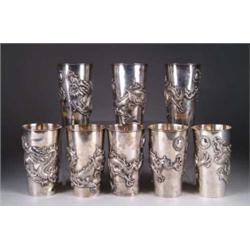 SET OF EIGHT ORIENTAL SIVLER TUMBLERS.
