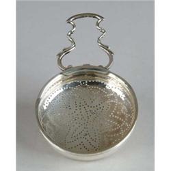 EARLY ENGLISH HANDLED TEA STRAINER.