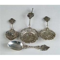 FOUR FANCY CONTINENTAL SILVER SPOONS.