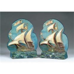 PAIR OF PAINTED SHIP BOOKENDS.