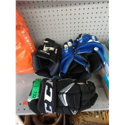 2 Pairs of New CCM Hockey Gloves - Black & Blue