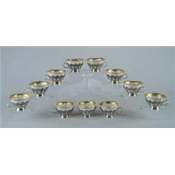 OUTSTANDING SET OF TWELVE TIFFANY STERLING AND LENOX HANDLED CUPS.