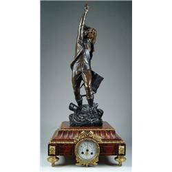 TWO PART FIGURAL BRONZE CLOCK.