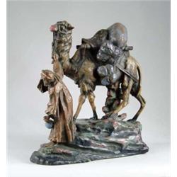 OUTSTANDING ART POTTERY FIGURAL GROUP OF CAMEL AND BEDOUIN.