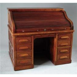 FINE RAISED PANEL MAHOGANY ROLL TOP DESK.