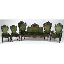 OUTSTANDING AND IMPORTANT FOUR PIECE LAMINATED ROSEWOOD CARVED PARLOR SET ATTRIBUTED TO CHARLES BOUD