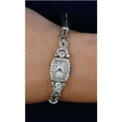 FINE LADIES DIAMOND AND PLATINUM WRIST WATCH BY TIFFANY & CO.