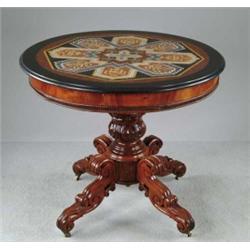 OUTSTANDING PETRA-DORA ROUND TOP MAHOGANY CENTER TABLE.