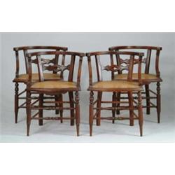 SET OF TWELVE WALNUT FIREHOUSE STYLE CANE SEAT DINING CHAIRS.