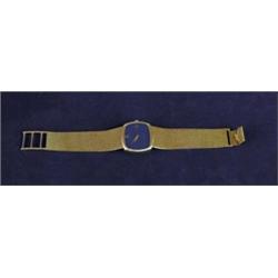 FINE 18K GOLD AND LAPIS WRISTWATCH BY BAUME & MERCIER.