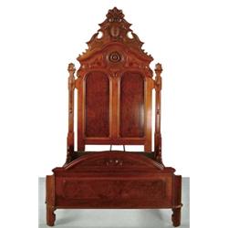 OUTSTANDING VICTORIAN WALNUT CARVED HIGH POST BED.