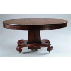 MAHOGANY EMPIRE STYLE OVAL DINING ROOM TABLE.