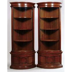 OUTSTANDING PAIR OF MAHOGANY GLASS DOOR BOW FRONT CORNER CABINETS.
