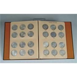 COIN: FULL SET OF 24 BRILLIANT UNCIRCULATED SILVER PEACE DOLLARS.