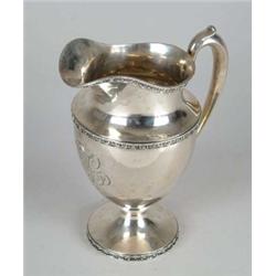 LARGE FOOTED WATER PITCHER BY BLACK, STARR & FROST.