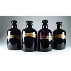 RARE SET OF FOUR APOTHECARY BOTTLES.