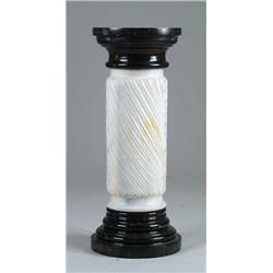 THREE-PART BLACK AND WHITE MARBLE PEDESTAL.
