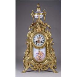 FANCY BRASS AND PORCELAIN MANTLE CLOCK.
