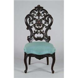 CARVED VICTORIAN SLIPPER CHAIR.