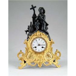 FIGURAL MANTLE CLOCK.