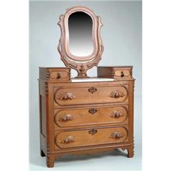 WALNUT DROP CENTER MARBLE TOP CHEST WITH OVAL MIRROR.